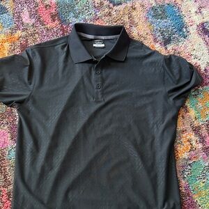 Nike Black Men's Polo Shirt with Subtle Texture